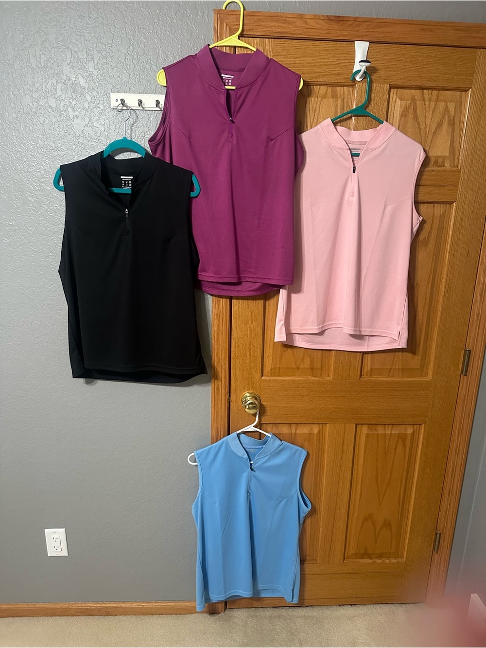 Lot of 4 Sleeveless Zip-Front golf shirts — Black, Plum, Pink, Light Blue